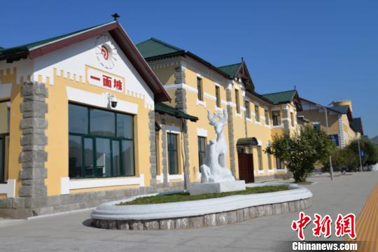 百年老站里的\"讲解员\" 退休前站好最后一班岗