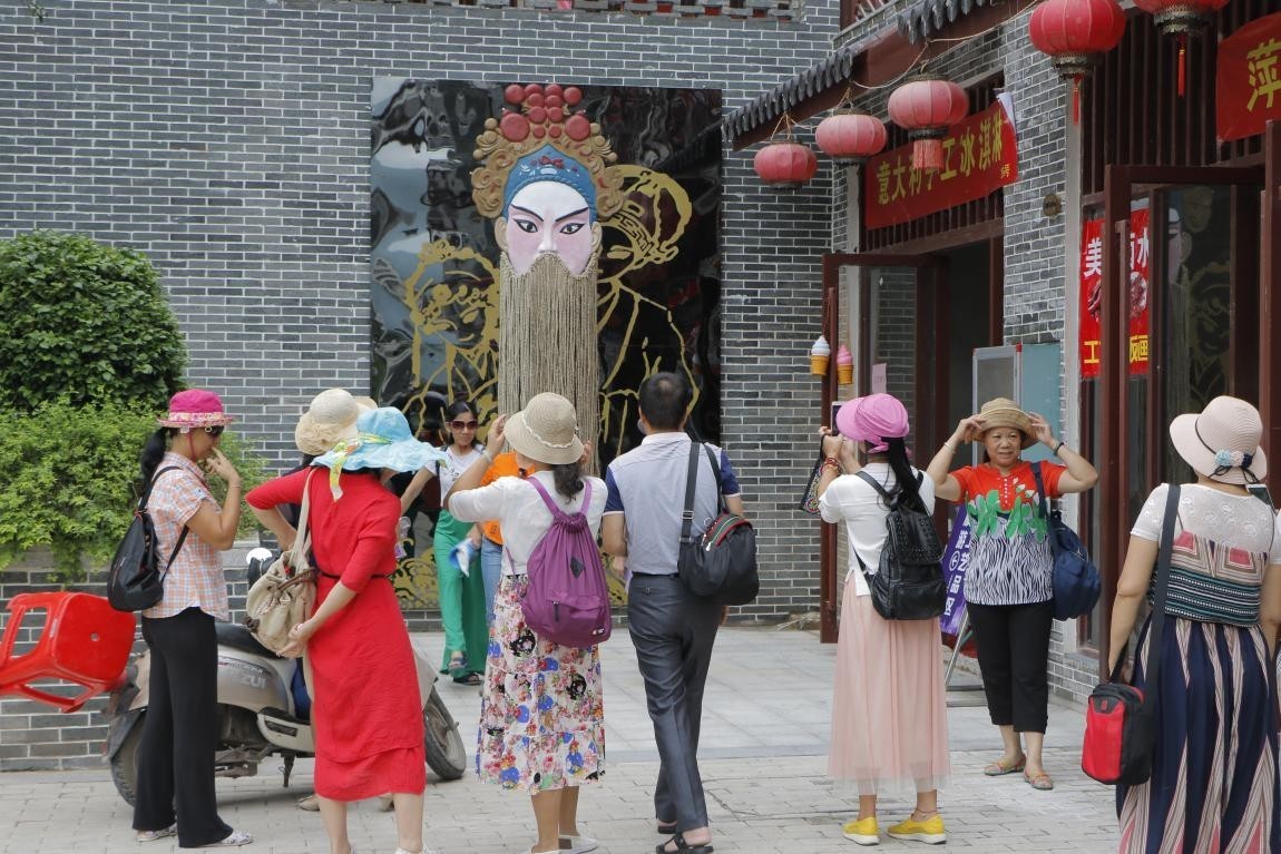陆川世客城举办客家小镇开街文化庆典活动