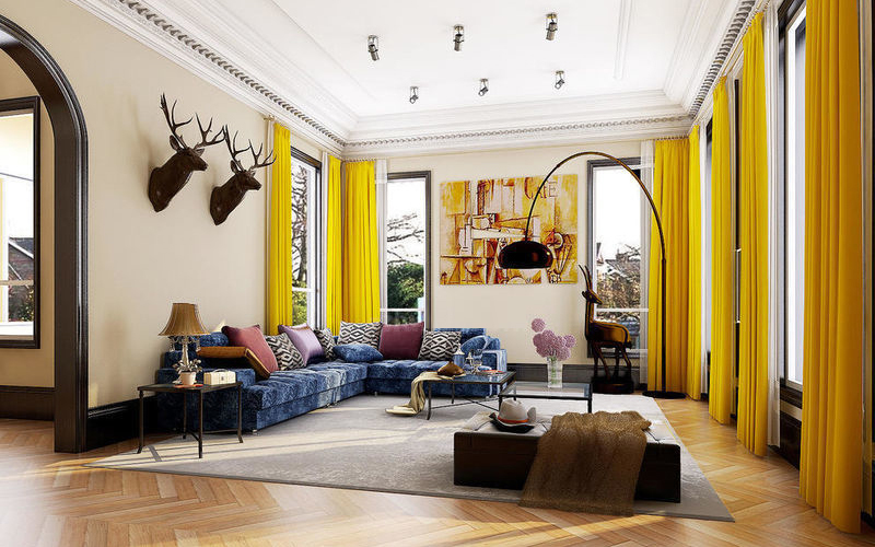 沙发上放置几张深浅不一色系的靠枕,与浅黄色窗帘形成强烈的颜色对比